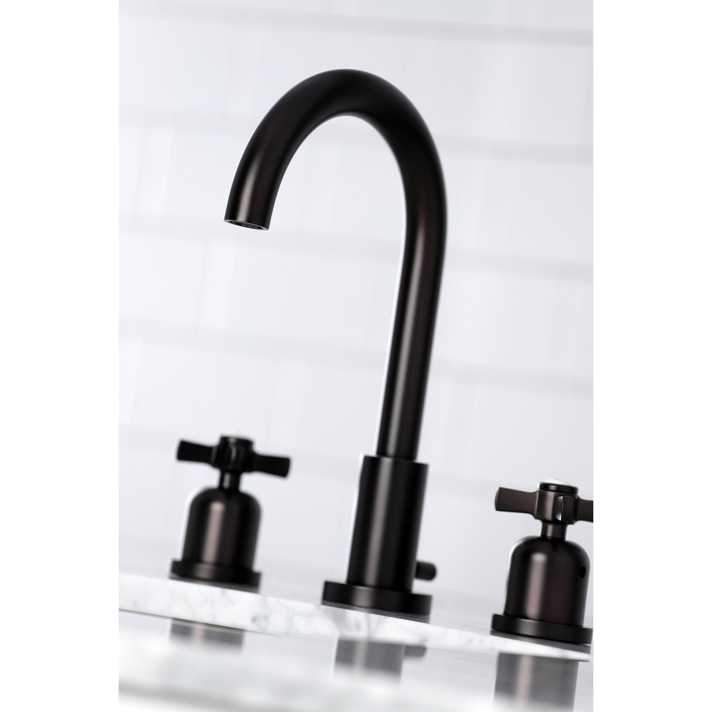 Close up Lifestyle image of Millennium widespread faucet in neutral bathroom in oil rubbed bronze finish