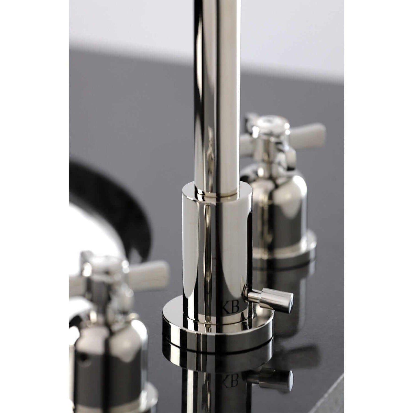 Close up Lifestyle image of Millennium widespread faucet showing mounting details in polished nickel finish