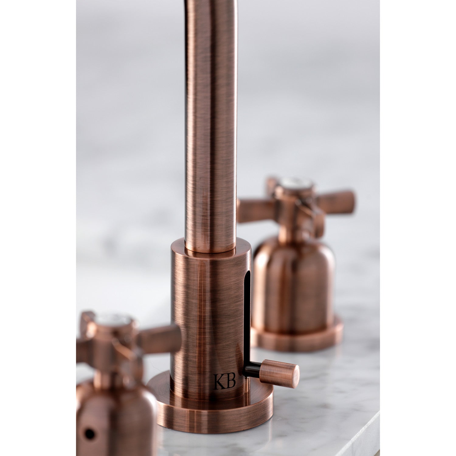 Close up Lifestyle image of Millennium widespread faucet showing mounting details in antique copperl finish