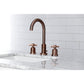 Side view lifestyle image in bathroom of Millennium widespread faucet in antique copper
