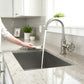 Kingston Brass KSD8503RX Belknap Single-Handle Bar Faucet in a contemporary kitchen with running water.