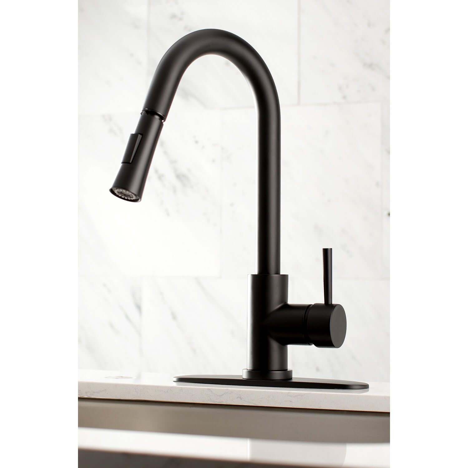 Kingston Brass LS8620DL single-handle matte black kitchen faucet installed with deck plate