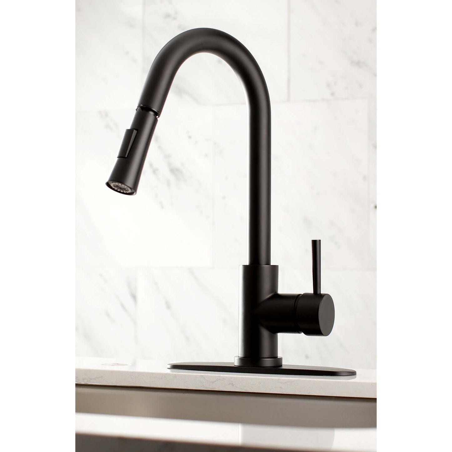 Kingston Brass LS8620DL single-handle matte black kitchen faucet installed with deck plate
