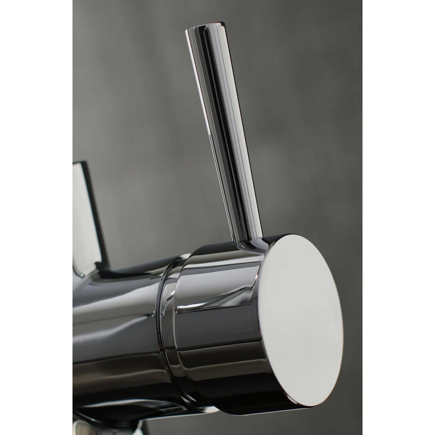 Close-up of handle on Kingston Brass Single-Handle Pull-Down Kitchen Faucet - LS862XDL-P showcasing sleek design.