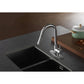 Profile of Kingston Brass LS862XDL single-handle chrome kitchen faucet in a neutral kitchen