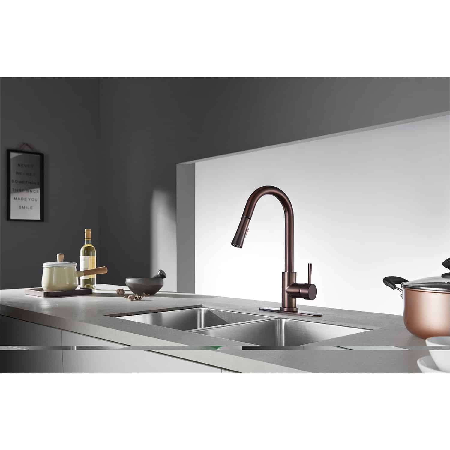 Kingston Brass LS8625DL single-handle oil rubbed bronze kitchen faucet installed with deck plate