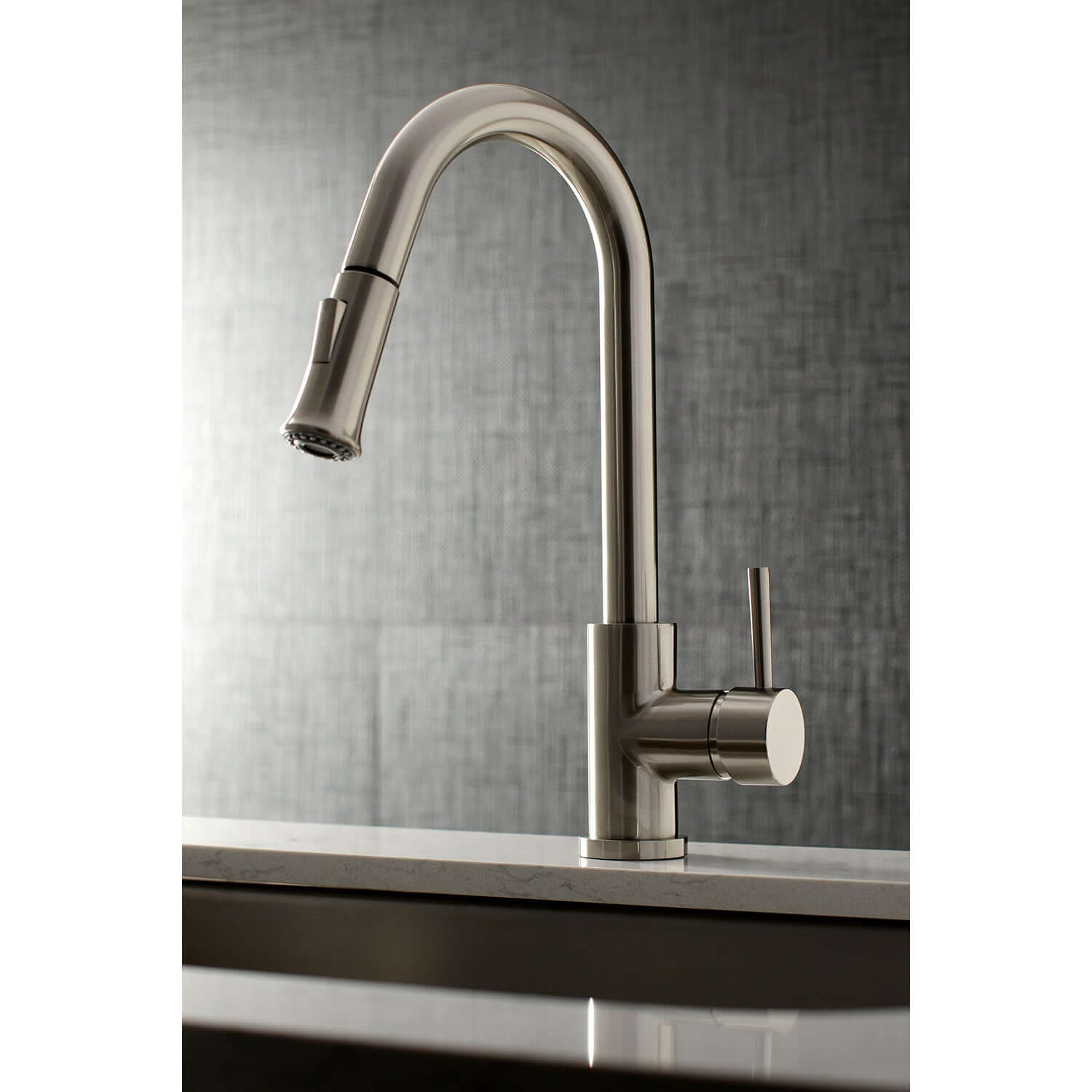 Kingston Brass LS8628DL single-handle brushed nickel kitchen faucet installed in neutral kitchen