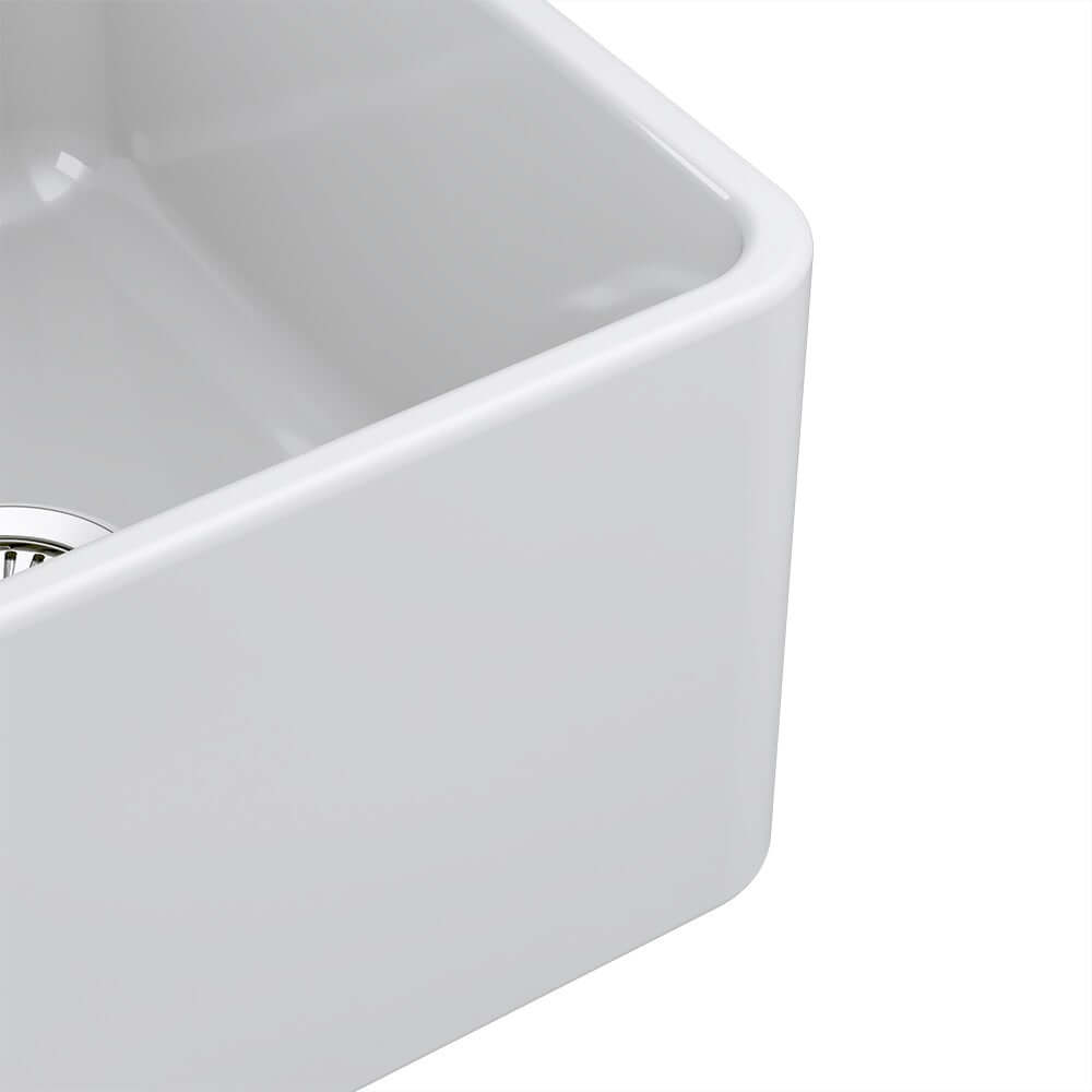 Latoscana 36" Reversible Fireclay Single Bowl Farmhouse Sink close-up front view showing interior detail and drain.