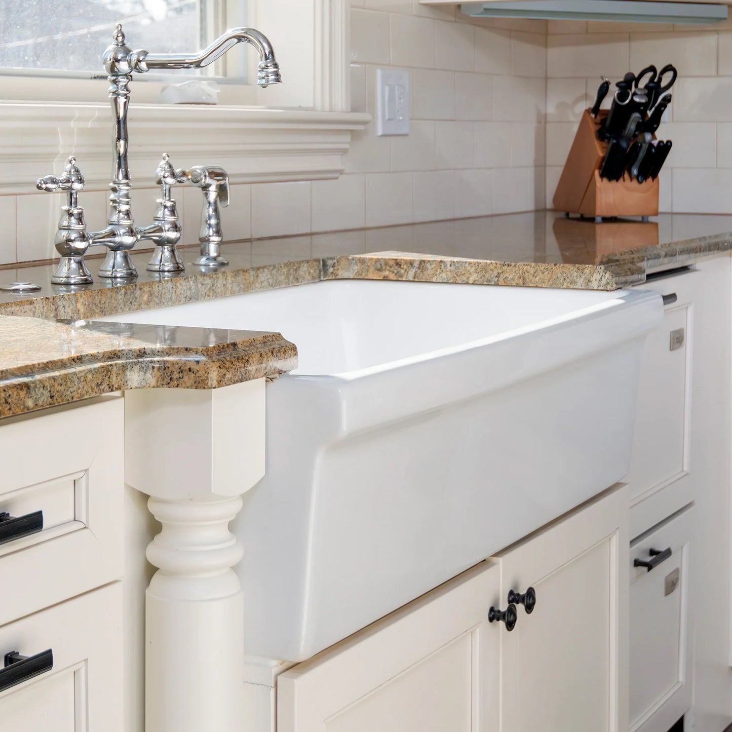 WHITEHAUS 30" Farmhaus Fireclay Quatro Alcove Reversible Sink WHQ330 in a modern kitchen with granite countertops.