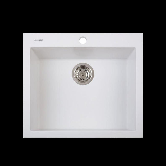 White kitchen sink with silver drain cover on a white background