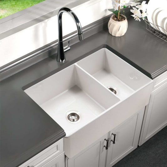 HOUZER PLATUS 33" White Fireclay Apron Front 60/40 Double Kitchen Sink - PTD-6040 WH installed in modern kitchen.