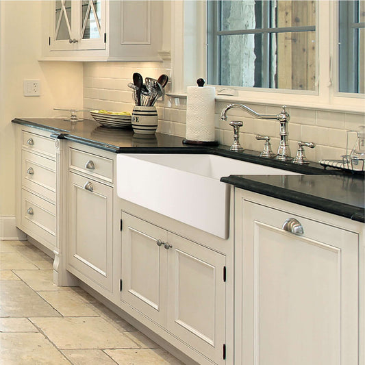 HOUZER PLATUS 36" Fireclay Apron Front Farmhouse Single Bowl Kitchen Sink in a stylish kitchen setting.