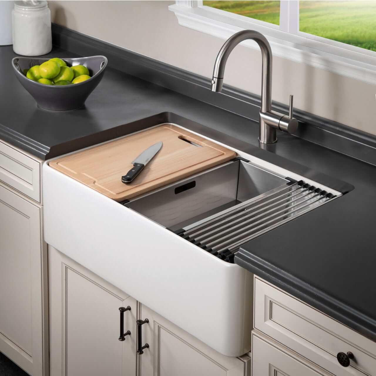Aspire 30" Apron Front Workstation Single Bowl Fireclay Sink with bamboo cutting board and sleek faucet, right side view.