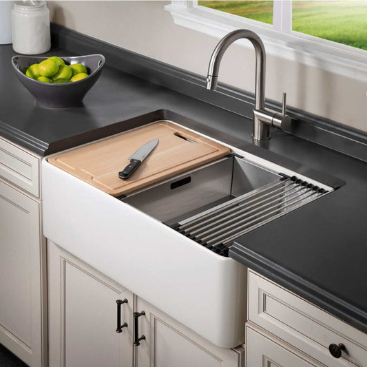 Aspire 30" Apron Front Workstation Single Bowl Fireclay Sink with bamboo cutting board and sleek faucet, right side view.