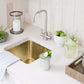 Lifestyle image of Thompson's Tamayo hand hammered, square bar sink.