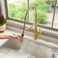 Ruvati RVF1233 Bianca Single-Handle Tall High-Arc Commercial Kitchen Faucet with Pre-Rinse Sprayer in a modern kitchen.
