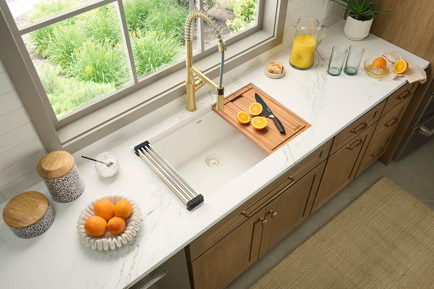 Ruvati RVF1233 Bianca Single-Handle Tall High-Arc Commercial Kitchen Faucet with Pre-Rinse Sprayer in modern kitchen setting.