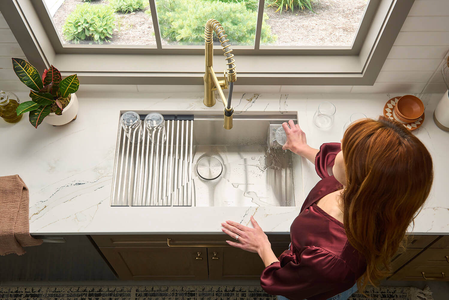 Ruvati RVF1233 Bianca Single-Handle Tall High-Arc Commercial Kitchen Faucet with Pre-Rinse Sprayer in a modern kitchen setting.