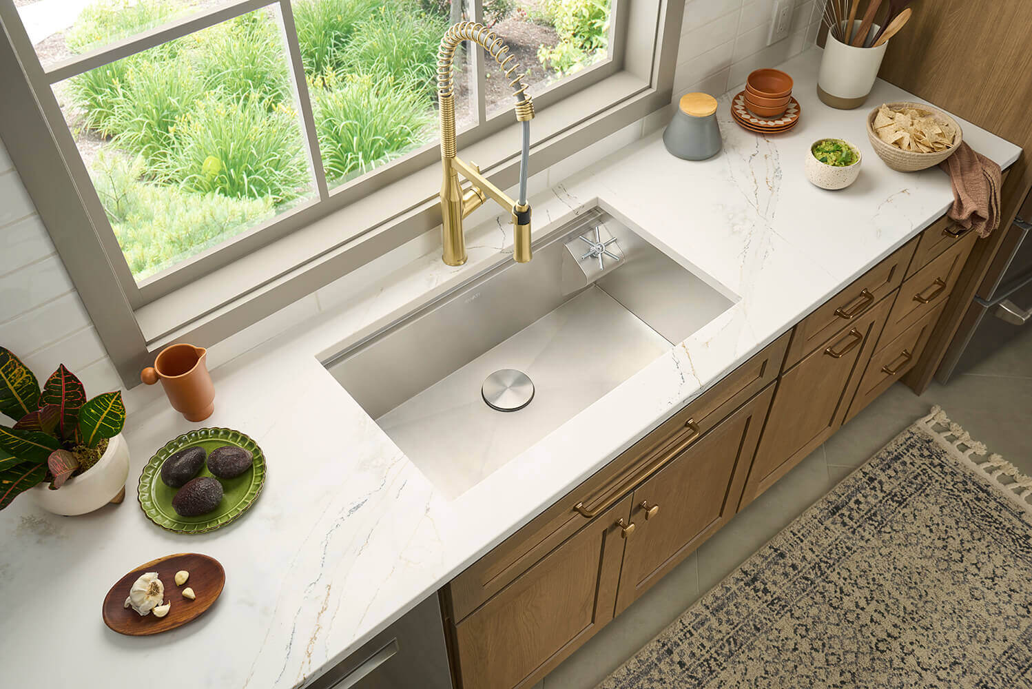 Ruvati RVF1233 Bianca Single-Handle Tall High-Arc Commercial Kitchen Faucet with Pre-Rinse Sprayer in kitchen sink setup.