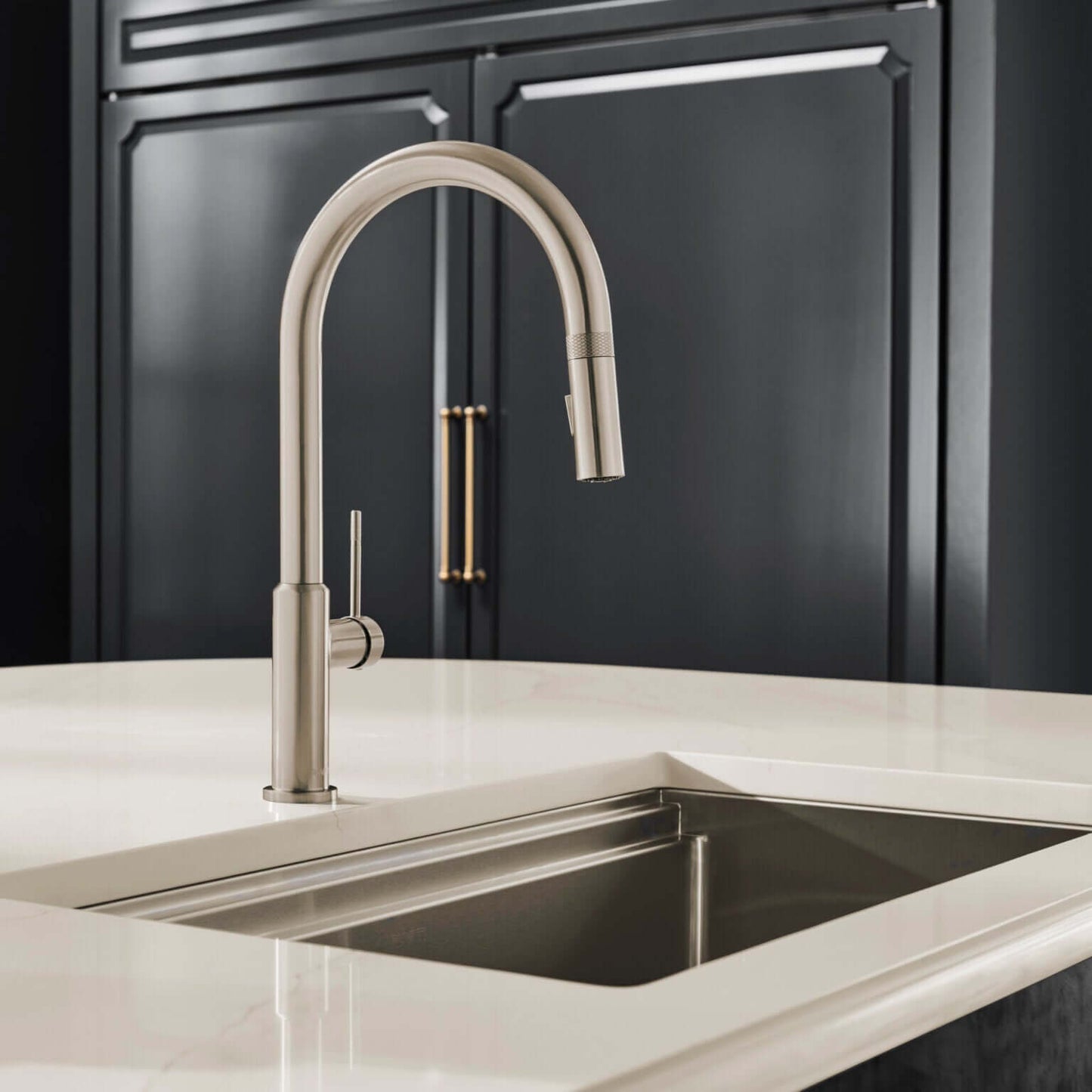 Ruvati RVF1237 Vestia Single-Handle Pull-Down Kitchen Faucet with Knurl Detail installed in modern kitchen.