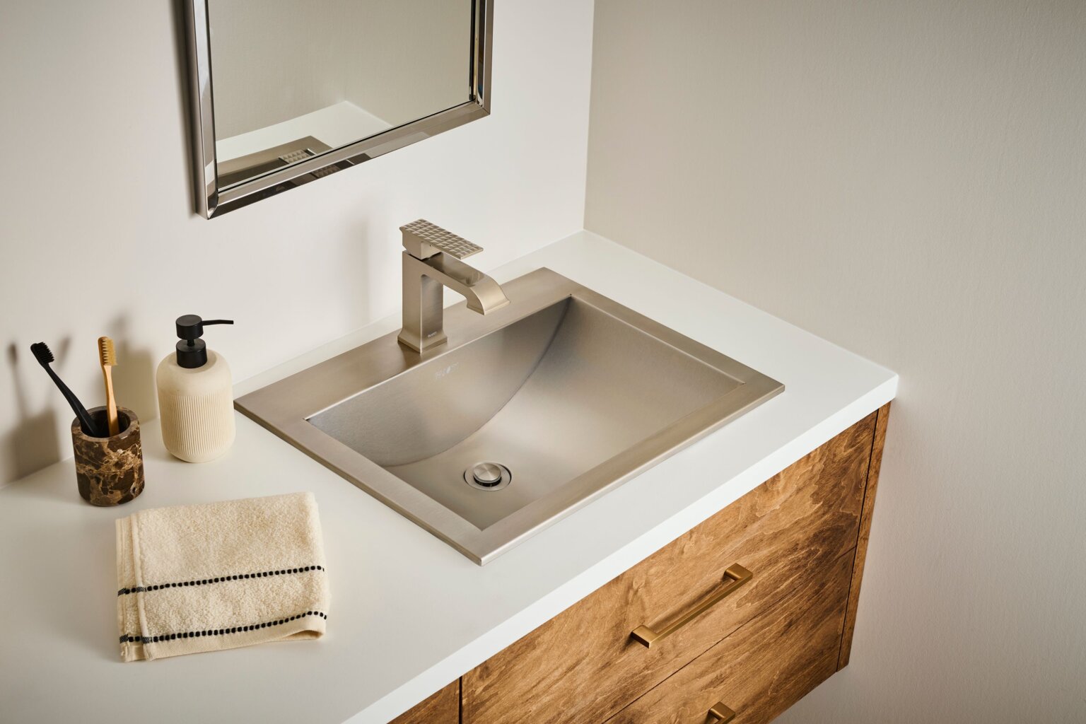 Ruvati RVF5132 Decora Single-Handle Square Bathroom Faucet in Brushed Nickel installed in a modern bathroom sink design.