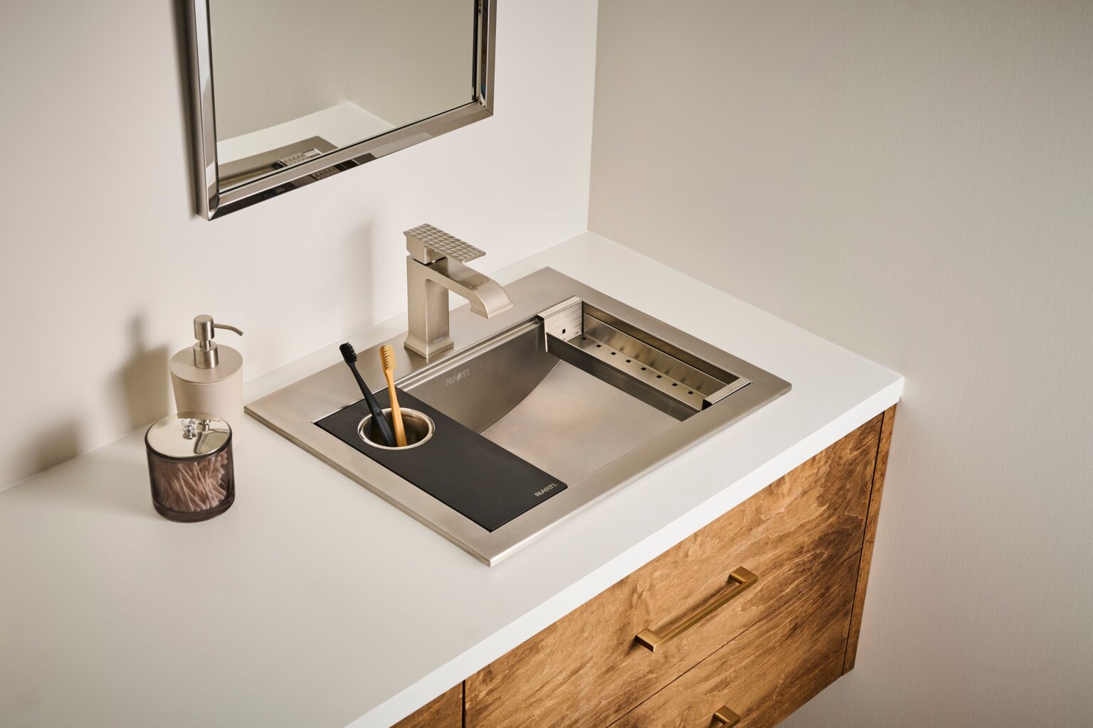 Ruvati RVF5132 Decora Single-Handle Square Bathroom Faucet in Brushed Nickel displayed on a modern bathroom countertop.