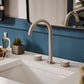 Ruvati RVF5232 Athena Two-Handle Widespread Bathroom Faucet with Stone Detail in modern bathroom setting.