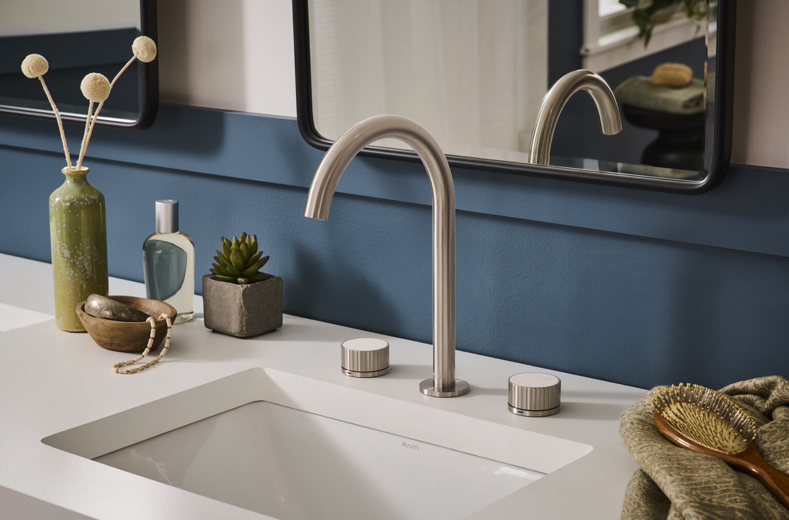 Ruvati RVF5232 Athena Two-Handle Widespread Bathroom Faucet with Stone Detail in modern bathroom setting.