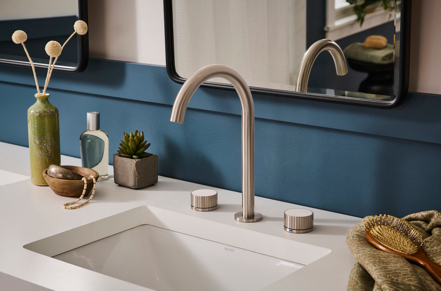 Ruvati RVF5232 Athena Two-Handle Widespread Bathroom Faucet with Stone Detail in modern bathroom setting.
