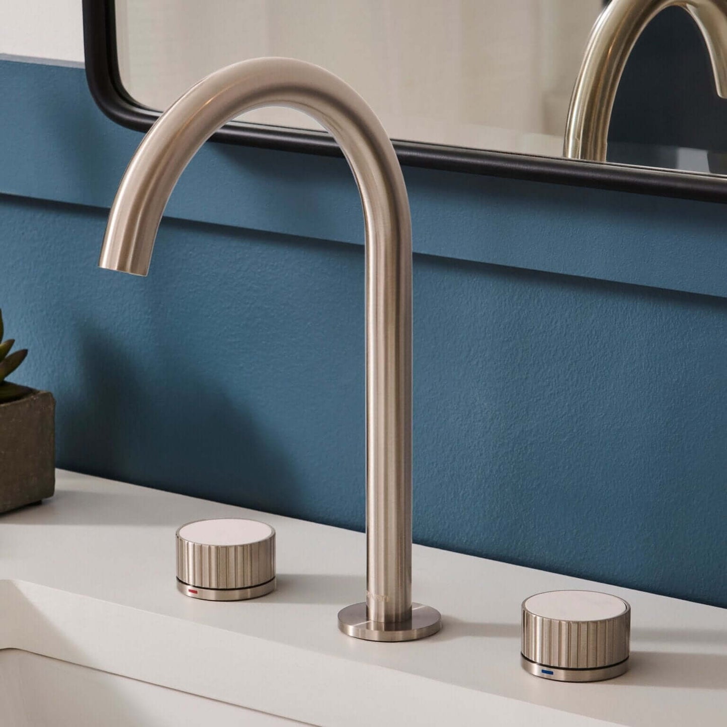 Ruvati RVF5232 Athena Two-Handle Widespread Bathroom Faucet with Stone Detail in Brushed Nickel finish.