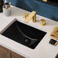 Ruvati RVF5235 Fabio Two-Handle Widespread Bathroom Faucet in Brushed Gold installed over a black sink.