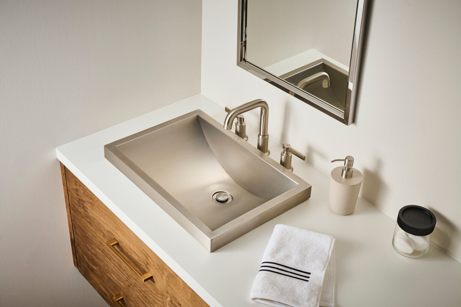 Ruvati RVF5236 Barolo Two-Handle Widespread Bathroom Faucet showcased above a sleek modern sink.
