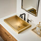 Ruvati RVF5236 Barolo Two-Handle Widespread Bathroom Faucet in a modern bathroom setting with a gold sink.