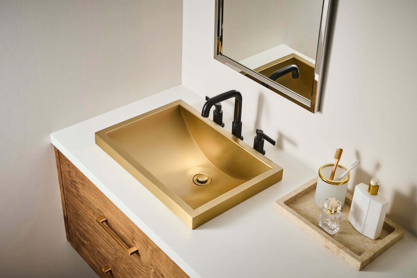 Ruvati RVF5236 Barolo Two-Handle Widespread Bathroom Faucet in a modern bathroom setting with a gold sink.