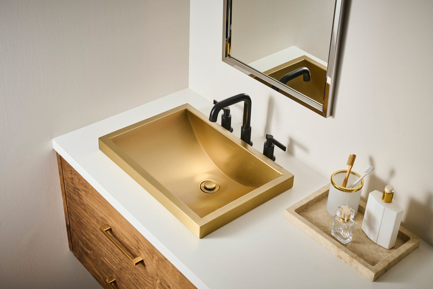 Ruvati RVF5236 Barolo Two-Handle Widespread Bathroom Faucet in a modern bathroom setting with a gold sink.