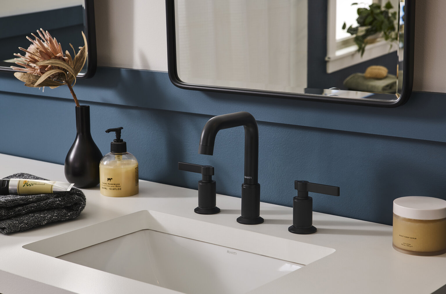 Ruvati RVF5236 Barolo Two-Handle Widespread Bathroom Faucet in a modern bathroom setting with knurled handles.