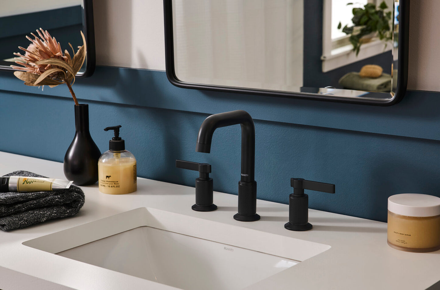 Ruvati RVF5236 Barolo Two-Handle Widespread Bathroom Faucet in a modern bathroom setting with knurled handles.
