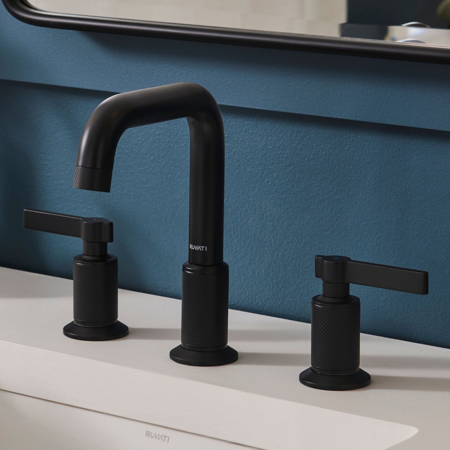 Ruvati RVF5236 Barolo Two-Handle Widespread Bathroom Faucet displayed with knurled handles and angular spout.