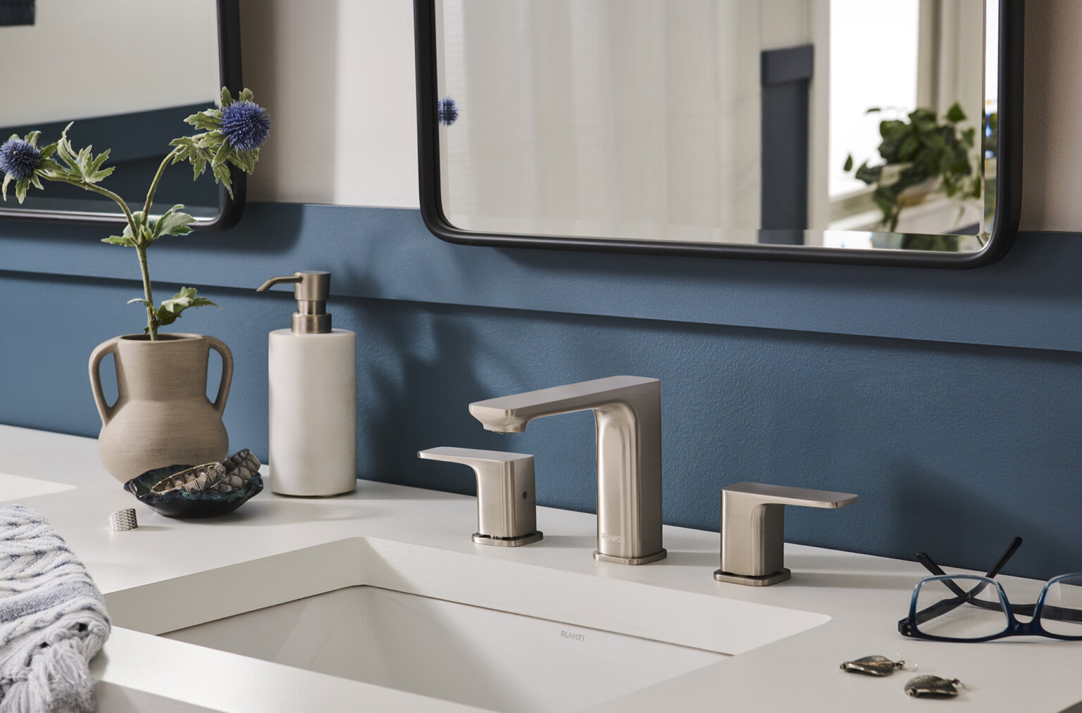 Ruvati RVF5237 Lanai Two-Handle Widespread Bathroom Faucet in Brushed Nickel displayed on a modern bathroom sink.
