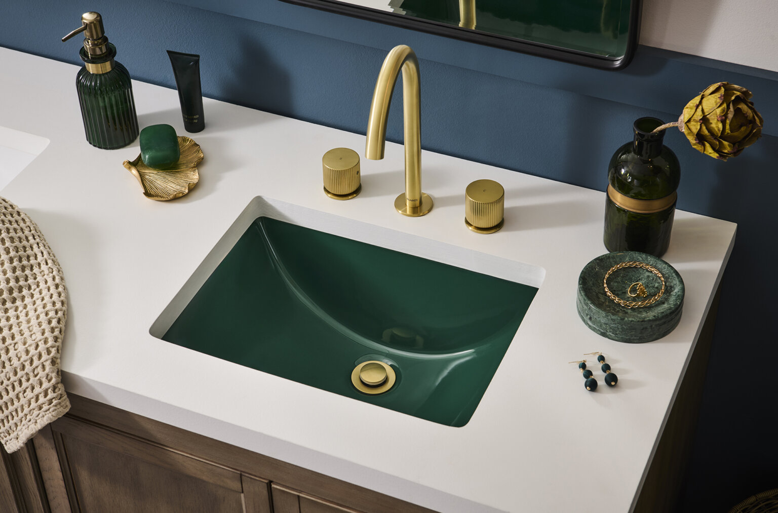 Ruvati RVF5238 Fabio Two-Handle Widespread Bathroom Faucet with Textured Knobs in Brushed Gold on a stylish sink.