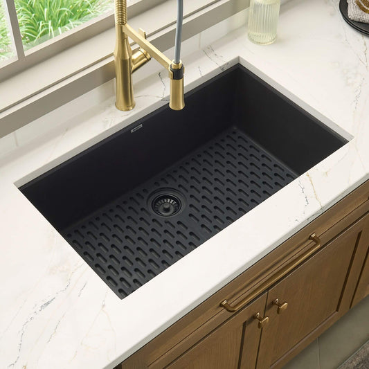 Ruvati RVG2027 27" Granite Composite Undermount Single Bowl Sink installed in a modern kitchen countertop.