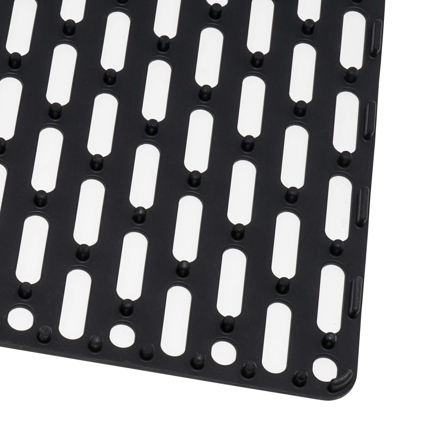 Black kitchen sink mat with perforated design for drainage and protection, ideal for use with Ruvati RVG2030 30" Granite Composite Sink.