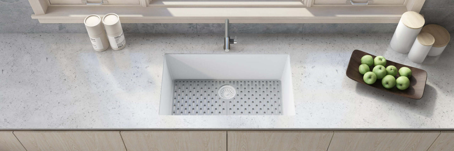 Ruvati RVG2030 30" Granite Composite Undermount Single Bowl Kitchen Sink with countertop and decorative bowl.