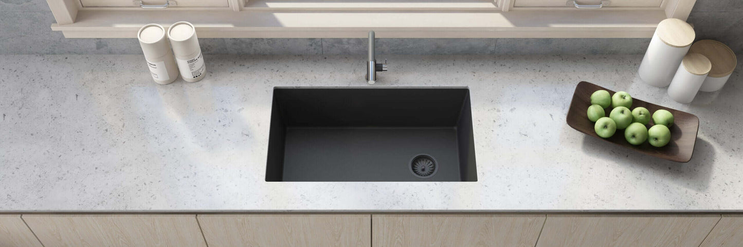 Ruvati 32" epiGranite undermount kitchen sink in Midnight Black, stylishly placed in modern kitchen countertop.