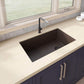 Ruvati 32" epiGranite undermount kitchen sink in Espresso Brown in a modern kitchen with countertop and faucet.