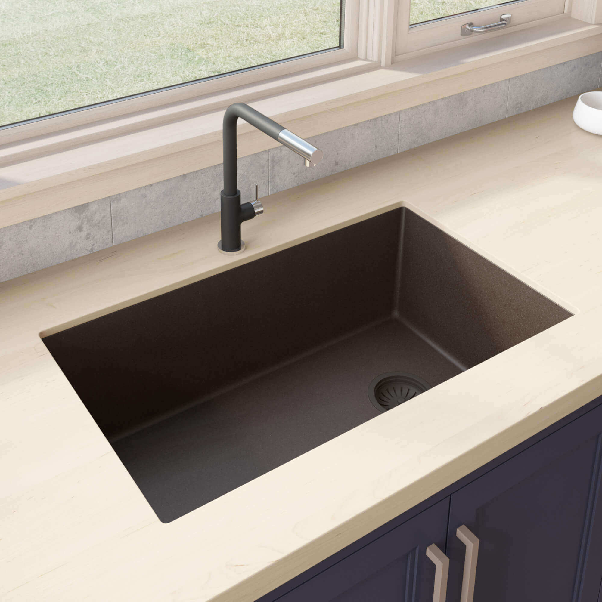 Ruvati 32" epiGranite undermount kitchen sink in Espresso Brown nstalled in modern kitchen with matching faucet.