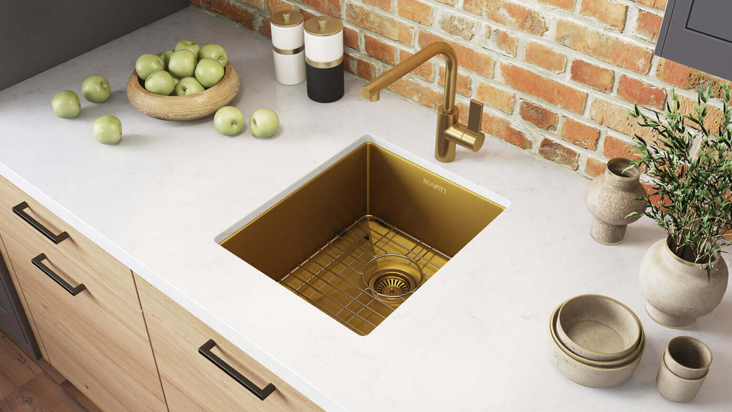 Ruvati 14" Terraza Nano-PVD Bar Prep Sink Undermount - RVH7114 in a stylish kitchen with gold accent.