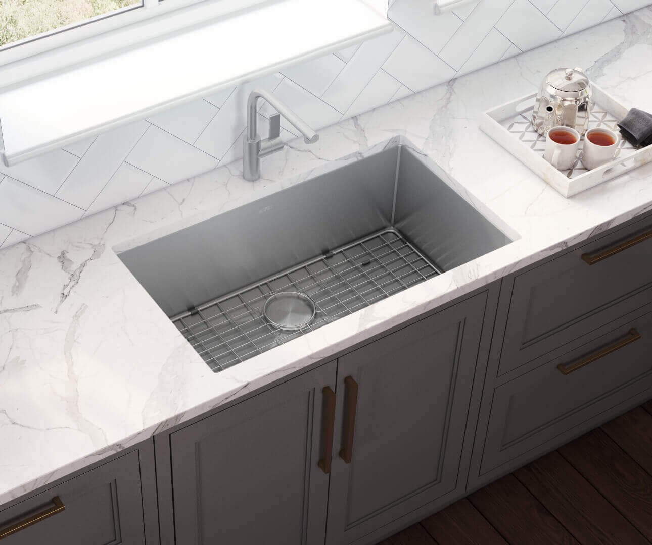 Ruvati 32" Gravena Single Bowl Undermount Kitchen Sink - RVH7400 installed in modern kitchen with marble countertop.