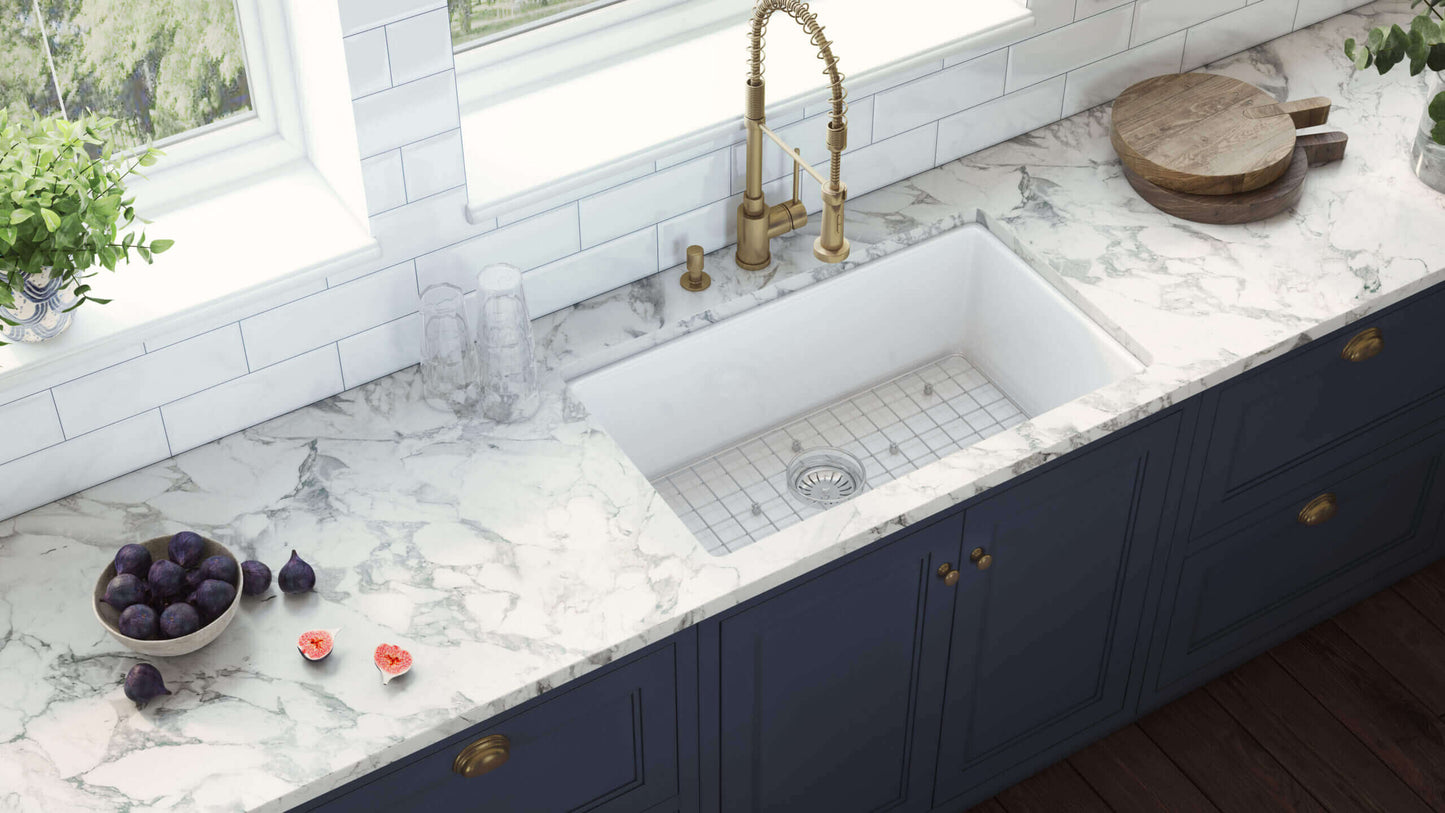 Ruvati 27" Fireclay Dual-Mount Kitchen Sink Single Bowl - RVL2707 with modern faucet and marble countertop.