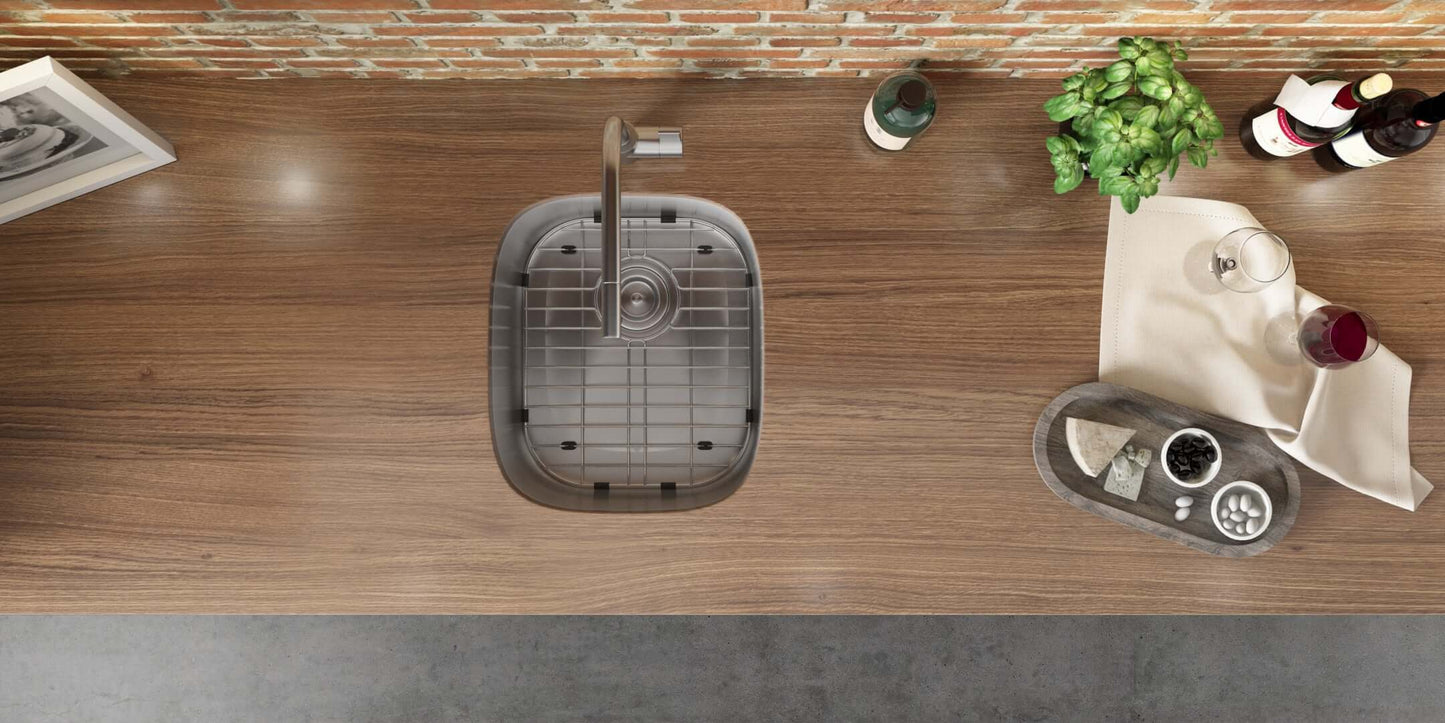 Ruvati 15" Undermount Bar Prep Sink Single Bowl - RVM4110 installed in a stylish kitchen countertop with decor.